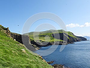 Picturesque view of the rocky coastline of Mykines, Faroe Islands