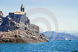 Picturesque view from sea the entrens to the Porto Venere with Doria castle. photo