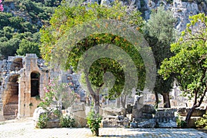 Picturesque views of the ruins of the ancient theater on the background of mountains