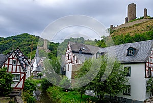 Picturesque village of Monreal with Lowenburg castle in the background, Eifel region, Germany