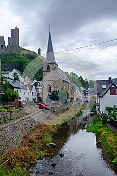 Picturesque village of Monreal with Lowenburg castle in the background, Eifel region, Germany