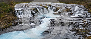 Picturesque waterfall Bruarfoss autumn view. Season changing in southern Highlands of Iceland