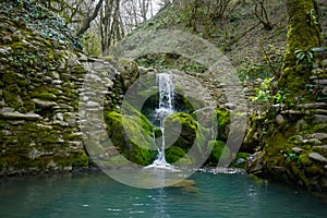 A picturesque waterfall in the jungle of the Krasnodar Territory