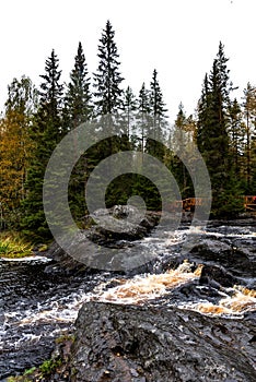 Picturesque waterfall in Ruskeala in autumn, Karelia, Russia