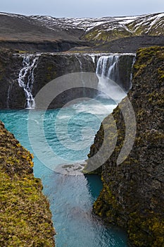 Picturesque waterfall Sigoldufoss autumn view. Season changing in southern Highlands of Iceland