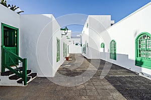 Picturesque white and green settlement called Pueblo Marinero designed by Cesar Manrique located in Costa Teguise, Lanzarote,