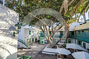 Picturesque white and green settlement called Pueblo Marinero designed by Cesar Manrique located in Costa Teguise, Lanzarote, photo