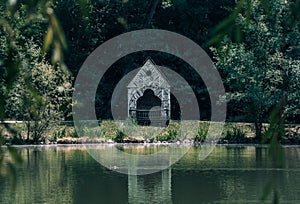 Picturesque wooden hut on lakeside at Maksimir park in Zagreb, Croatia