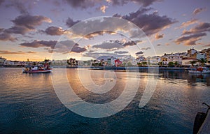 The pictursque port of Sitia, Crete, Greece at sunset. Sitia is a traditional town at the east Crete near the beach of palm trees,