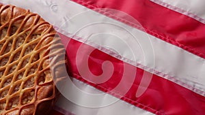 Pie laying on USA flag.