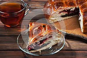 Pie on wooden background close-up