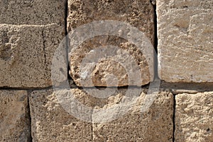 Piece of ancient stone wall in old Jaffa Port, Tel Aviv, Israel