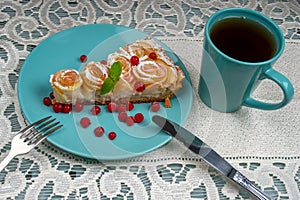 Piece of Apple pie with roses and tea