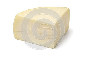 Piece of artisanal of semi soft Italian Bel Paese cheese on white background close up photo