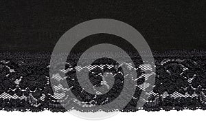 Piece of black fabric with lace isolated on white