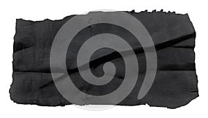 A piece of black satin fabric on a white background. Isolate a crumpled piece of fabric