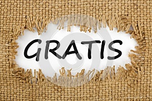 Gratis written in hole on the burlap photo