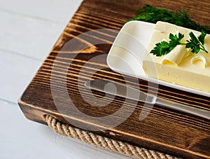 piece of butter on a wooden desk