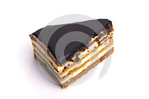 Piece of cake called Bird's Milk isolated on a white background