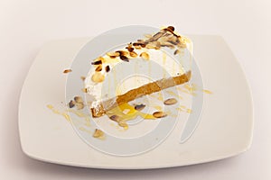 Piece of cake with caramel and hazelnut