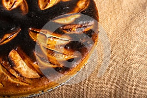piece of cake. failed apple pie. burnt on top and the dough did not rise during baking. textured burnt pie crust. photo