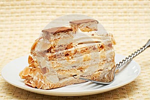 Piece of caramel meringue cake