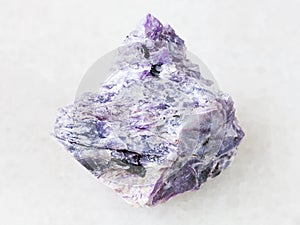 piece of charoite stone on white