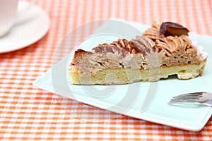 Piece of chestnu cake on a dish