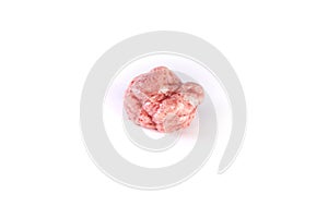 Piece of chewed red bubble gum isolated over white