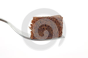 Piece of chocolate cake on fork