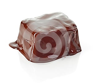 Piece of chocolate covered with melted chocolate
