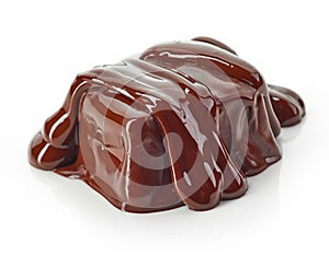Piece of chocolate covered with melted chocolate