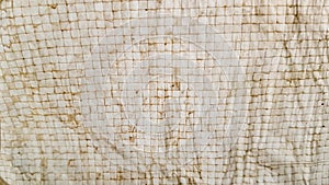 Piece of cloth with square patttern over it