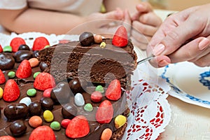 Piece of creamy chocolate cake close up