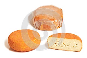 Piece of creamy red molded soft french cheese