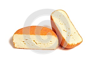 Piece of creamy red molded soft French cheese
