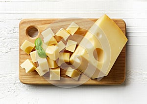 Piece and cubes of swiss cheese