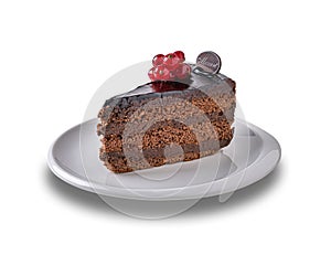 Piece of chocolate Mozart cake on porcelain plate isolated on white background