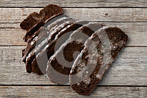 Piece of dark Molded bread photo