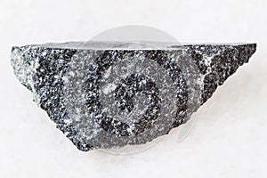 piece of dolerite (diabase) stone on white