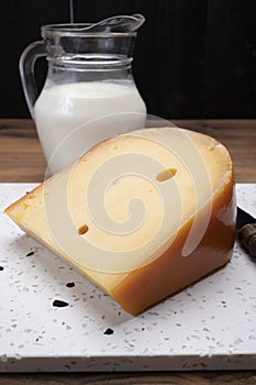 Piece of Dutch Gouda cheese ade from cow milk