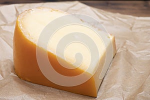 Piece of Dutch Gouda cheese ade from cow milk