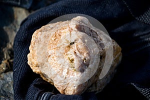 Piece of feldspar of pinkish color close up