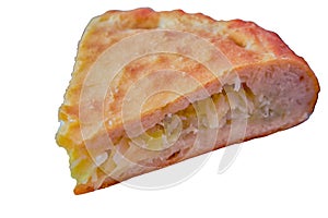 A piece of fresh pie with cabbage isolated on a white background.