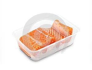 Piece of fresh salmon fillet sliced in plastic box isolated on white background ,include clipping path