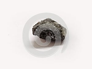 A piece of Galena mineral isolated on white background.