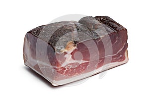 Piece of German speck close up on white background photo