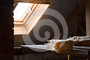 A piece of glass wool lies against the background of the window