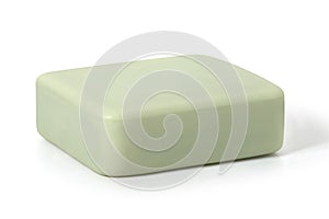 Piece of green toilet soap on a white background. Full depth of field.