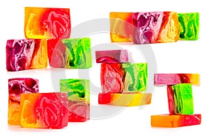 Piece of handmade bright soap. Close-up on a white background